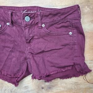 American Eagle Size 2 Burgundy Denim Shorts Raw Hem